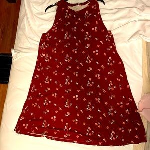 Flared dress. Falls to just below knee. Is 36” down center back seam